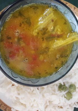 A picture of Tomato drumstick daal.