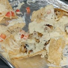A picture of Chicken Alfredo Nachos.