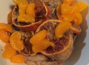 Una foto de Chuletas en Maridaje de Mandarina y Naranjas