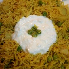 A picture of Tawa pulav with curd.