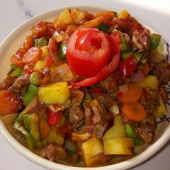 A picture of Potato and veggies soup.
