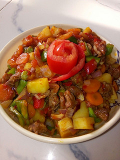 A picture of Potato and veggies soup.