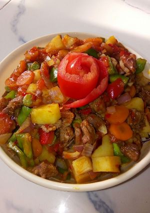 A picture of Potato and veggies soup.