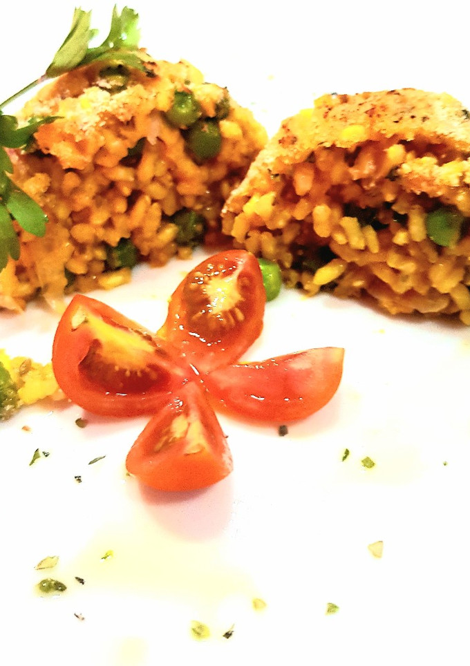 Una foto de 🌻Flan de arroz integral con guisantes y queso🌺