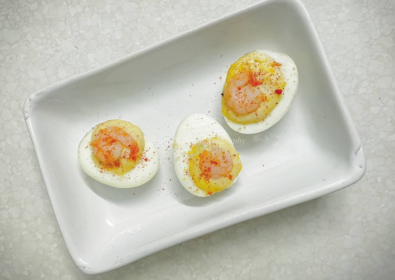 Shrimp with mayonnaise on devilish eggs