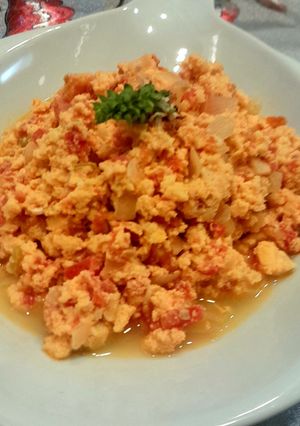 A picture of Eggs with Tomatoes (Jaz Maz).
