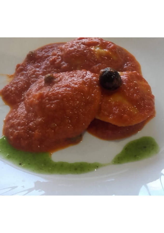 Una foto de Ravioles de bolognesa