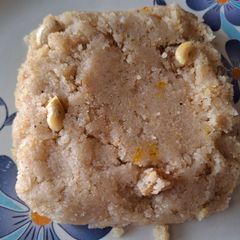 A picture of Semolina halwa with banana.