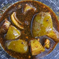 A picture of Kachi Kairi (Raw Mango) Meetha achaar.