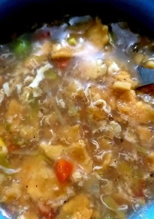 A picture of Mix veggies and chicken soup.