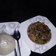 A picture of White bitter leaf okro soup with semo.