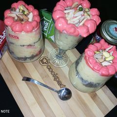 A picture of Custard fruit trifle in cups.