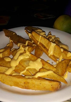 Una foto de Papas cheddar rústicas