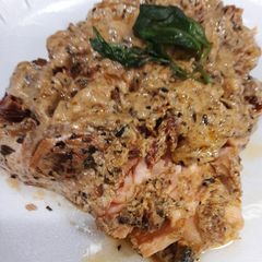 Pan fried Salmon with creamy sun-dried tomato sauce A picture of Pan fried Salmon with creamy sun-dried tomato sauce.