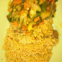 A picture of Cuscus with veggie sauce.