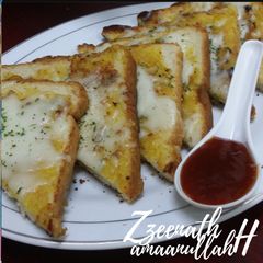 Stovetop Cheesy Suji Toast A picture of Stovetop Cheesy Suji Toast.