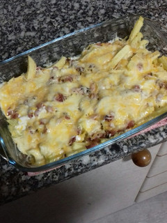 Una foto de Patatas estilo Foster con salsa ranchera