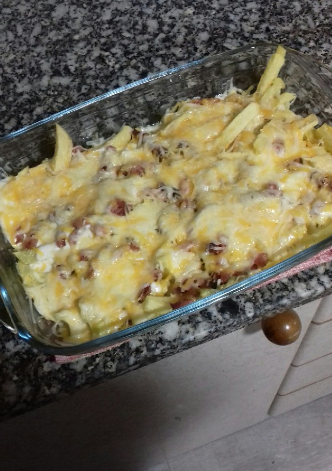 Una foto de Patatas estilo Foster con salsa ranchera