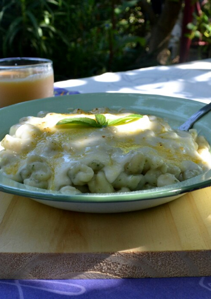 Una foto de Ñoquis gratinados con perejil y salsa blanca 😌