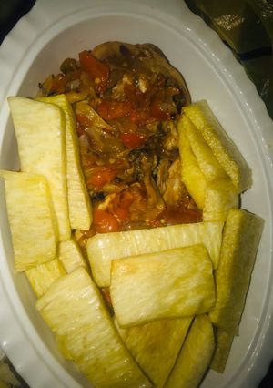 A picture of Yam with chicken sauce.