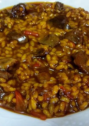 Una foto de Arroz con higaditos de pollo
