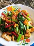 Tumis sawi manis campur tahu