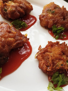 A picture of Schezwan Cabbage Fritters.