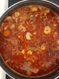 Lentejas con calamares, almejas y gambas