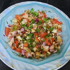 A picture of Green moong sprouted vegetables salad 🥗.