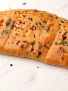 صورة لوصفة خبز الثوم و الجبن على طريقة دومينوز🤤