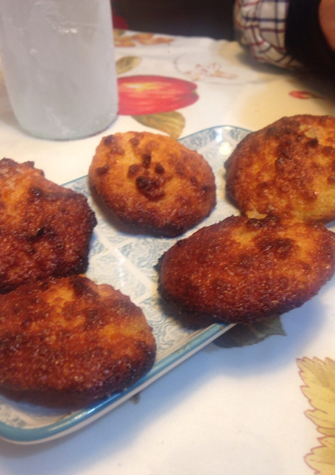 Una foto de Galletas de coco, almendra molida y mermelada de naranja