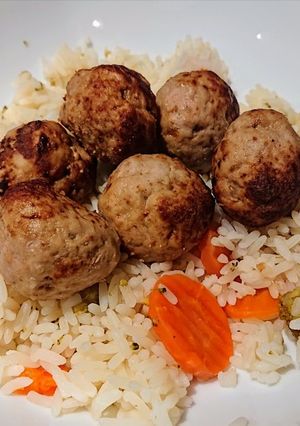 A picture of Cujan Pork Balls With Vegetable Rice.