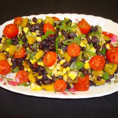 A picture of Black beans and corn salad with roasted peppers.