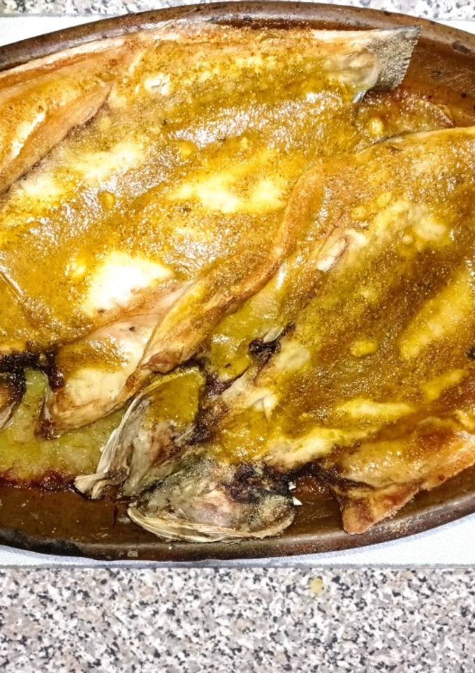 Una foto de Lubina al horno