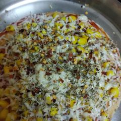 A picture of Cheese corn pizza.