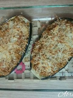 Una foto de Berenjenas al horno rellenas de carne