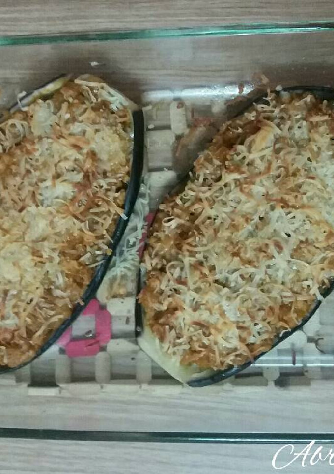 Una foto de Berenjenas al horno rellenas de carne