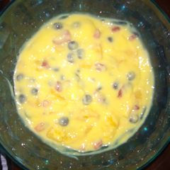 Fruit salad with vanilla custard A picture of Fruit salad with vanilla custard.