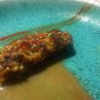 Socarrat de arroz bomba en jugo de carne y pescado