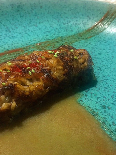 Una foto de Socarrat de arroz bomba en jugo de carne y pescado