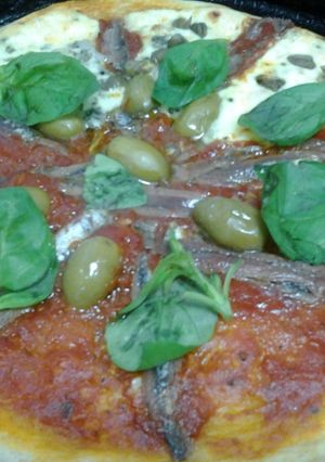 Una foto de Pizza con masa (integral)