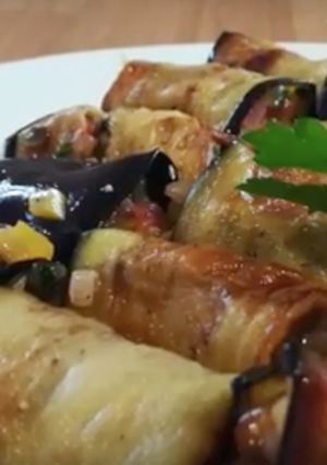 A picture of Aubergine and ratatouille rolls.
