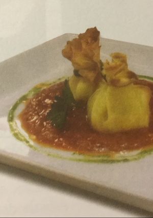 Una foto de Crepes de ricota y panceta