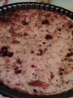 Una foto de Pudin de pan y virutas de chocolate