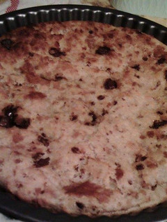 Una foto de Pudin de pan y virutas de chocolate