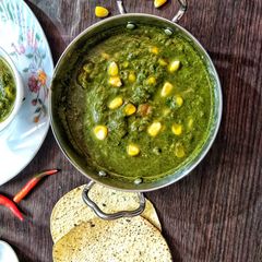 A picture of Palak corn curry.