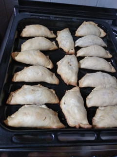 Una foto de Empanadas de choclo y cebolla