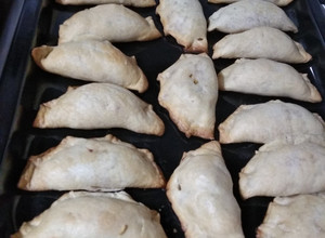 Una foto de Empanadas de choclo y cebolla