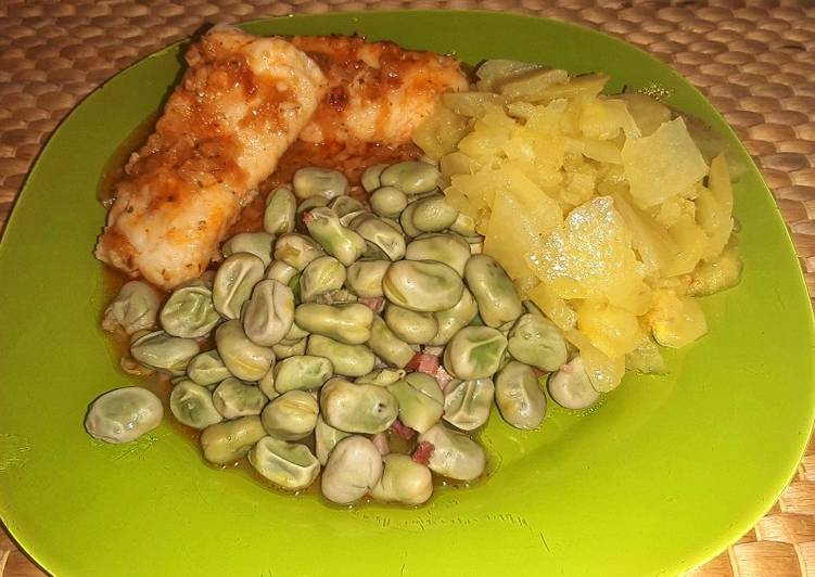 Merluza al ajillo con guarnición de habas frescas y patata