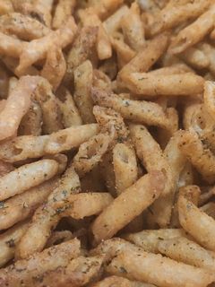 Una foto de Snack de macarrones fritos aliñados (crackers)